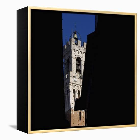 Siena Architectural Details. Glimpse of Crenellated Tower with Bell-Mike Burton-Framed Premier Image Canvas