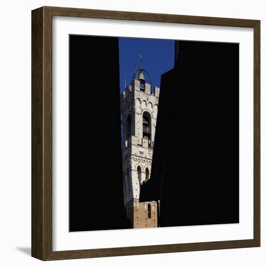 Siena Architectural Details. Glimpse of Crenellated Tower with Bell-Mike Burton-Framed Photographic Print