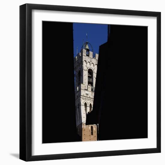Siena Architectural Details. Glimpse of Crenellated Tower with Bell-Mike Burton-Framed Photographic Print