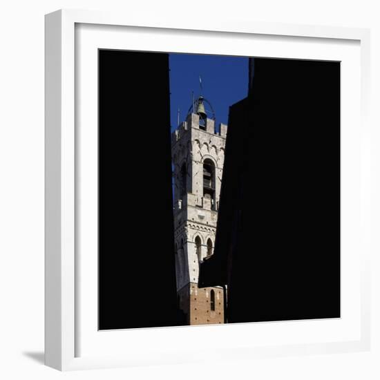 Siena Architectural Details. Glimpse of Crenellated Tower with Bell-Mike Burton-Framed Photographic Print