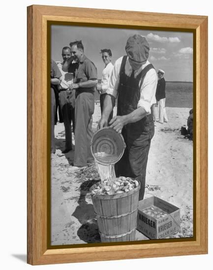 Sights of a Typical Summer at Cape Cod: Watering Clams to Aid the Steaming for Clambake-null-Framed Premier Image Canvas