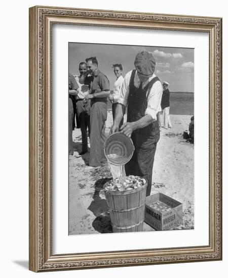 Sights of a Typical Summer at Cape Cod: Watering Clams to Aid the Steaming for Clambake-null-Framed Photographic Print