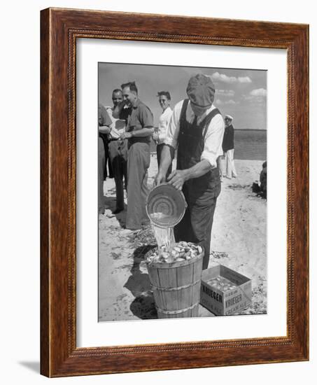 Sights of a Typical Summer at Cape Cod: Watering Clams to Aid the Steaming for Clambake-null-Framed Photographic Print