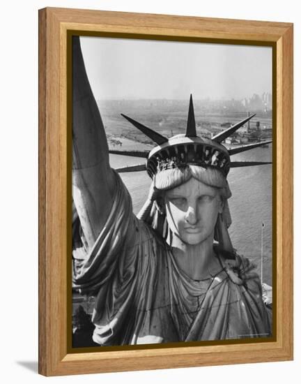 Sightseers Hanging Out Windows in Crown of Statue of Liberty with NJ Shore in the Background-Margaret Bourke-White-Framed Premier Image Canvas