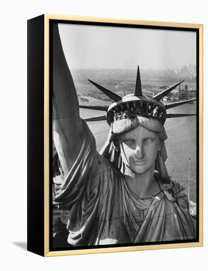 Sightseers Hanging Out Windows in Crown of Statue of Liberty with NJ Shore in the Background-Margaret Bourke-White-Framed Premier Image Canvas