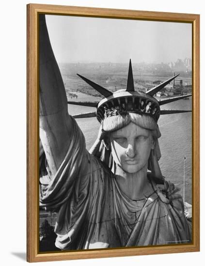 Sightseers Hanging Out Windows in Crown of Statue of Liberty with NJ Shore in the Background-Margaret Bourke-White-Framed Premier Image Canvas