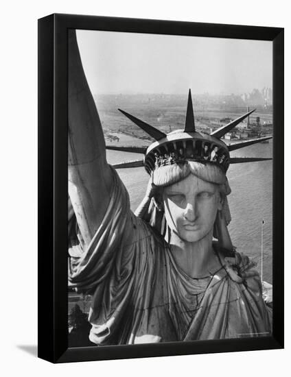 Sightseers Hanging Out Windows in Crown of Statue of Liberty with NJ Shore in the Background-Margaret Bourke-White-Framed Premier Image Canvas