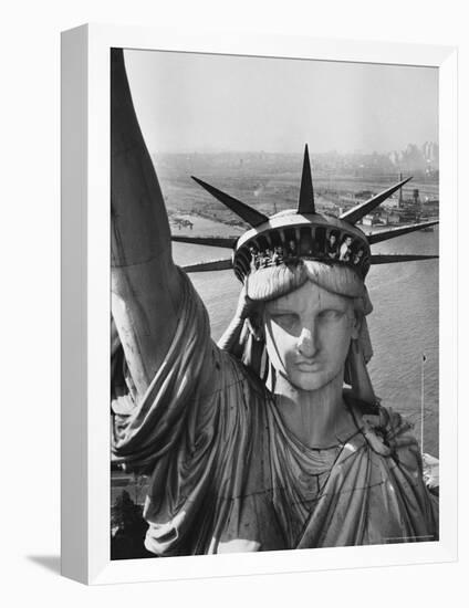 Sightseers Hanging Out Windows in Crown of Statue of Liberty with NJ Shore in the Background-Margaret Bourke-White-Framed Premier Image Canvas