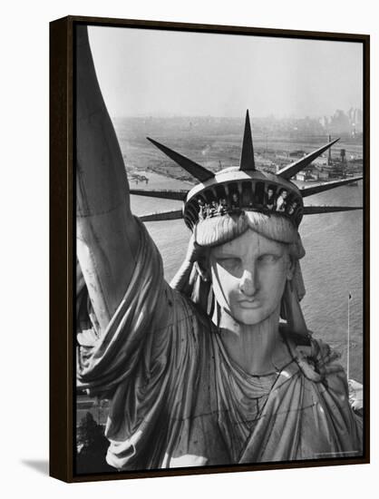 Sightseers Hanging Out Windows in Crown of Statue of Liberty with NJ Shore in the Background-Margaret Bourke-White-Framed Premier Image Canvas