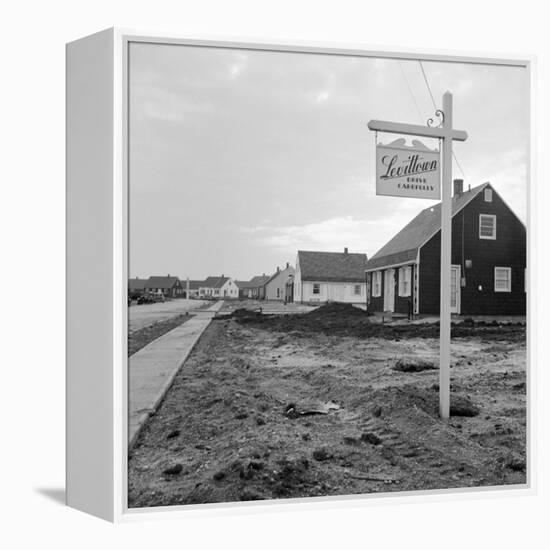 Sign Declaring the Area as Levittown Outside Newly Constructed Homes-null-Framed Premier Image Canvas