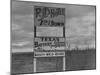 Sign on Road to Oil Boomtown-Carl Mydans-Mounted Photographic Print