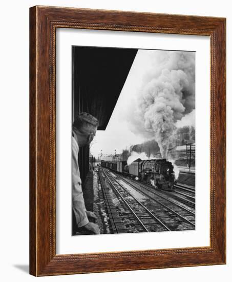 Signalman Nick Carter Watching Oncoming train at Station on the New York Central's Mohawk Division-Alfred Eisenstaedt-Framed Photographic Print