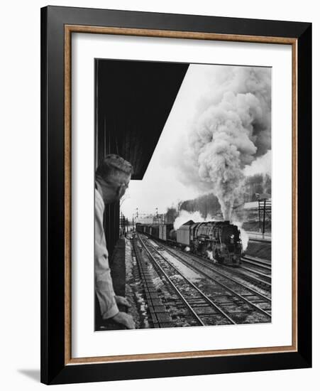 Signalman Nick Carter Watching Oncoming train at Station on the New York Central's Mohawk Division-Alfred Eisenstaedt-Framed Photographic Print