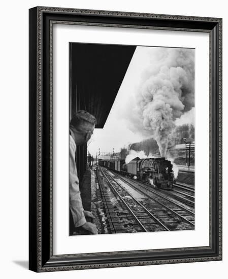 Signalman Nick Carter Watching Oncoming train at Station on the New York Central's Mohawk Division-Alfred Eisenstaedt-Framed Photographic Print