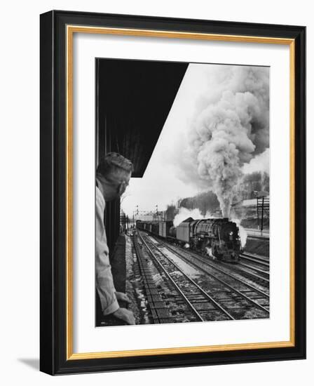 Signalman Nick Carter Watching Oncoming train at Station on the New York Central's Mohawk Division-Alfred Eisenstaedt-Framed Photographic Print