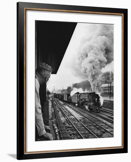 Signalman Nick Carter Watching Oncoming train at Station on the New York Central's Mohawk Division-Alfred Eisenstaedt-Framed Photographic Print