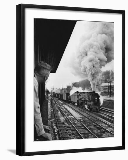 Signalman Nick Carter Watching Oncoming train at Station on the New York Central's Mohawk Division-Alfred Eisenstaedt-Framed Photographic Print