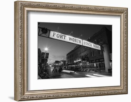 Signboard over a road at dusk, Fort Worth Stockyards, Fort Worth, Texas, USA-null-Framed Photographic Print