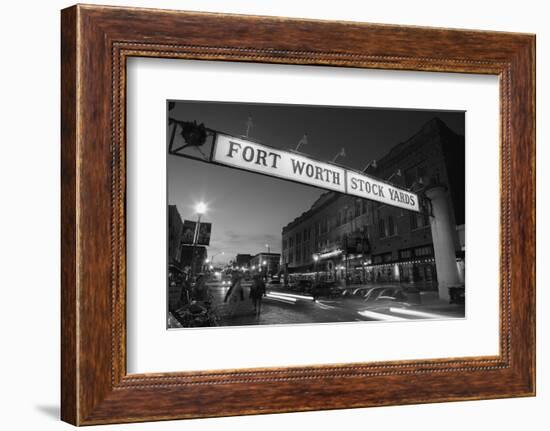 Signboard over a road at dusk, Fort Worth Stockyards, Fort Worth, Texas, USA-null-Framed Photographic Print