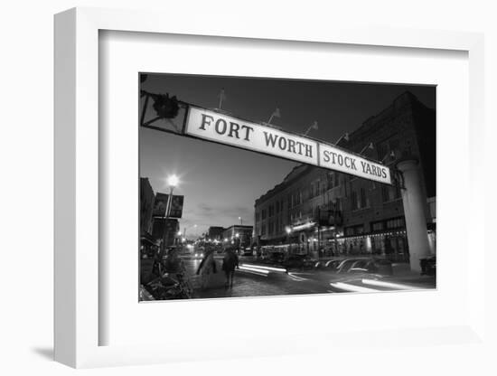 Signboard over a road at dusk, Fort Worth Stockyards, Fort Worth, Texas, USA-null-Framed Photographic Print