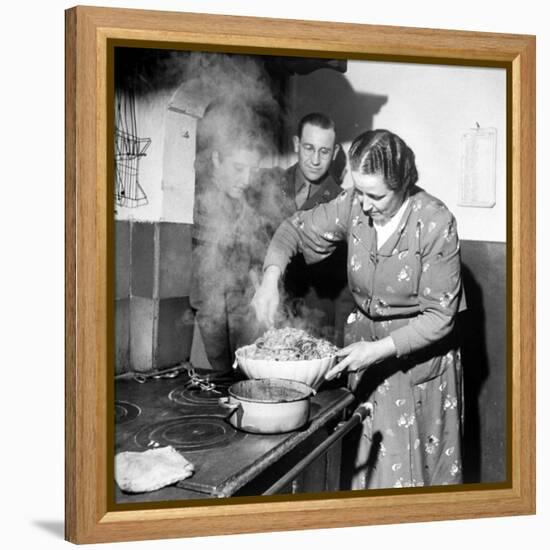 Signora Socci Cooking Spaghetti Dinner for American Sergeant Alexander before He Leaves-John Phillips-Framed Premier Image Canvas