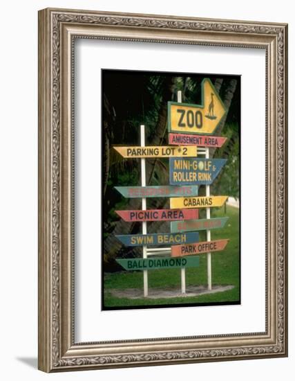 Signs Pointing Every Which Way, Key Biscayne, Florida-George Silk-Framed Photographic Print