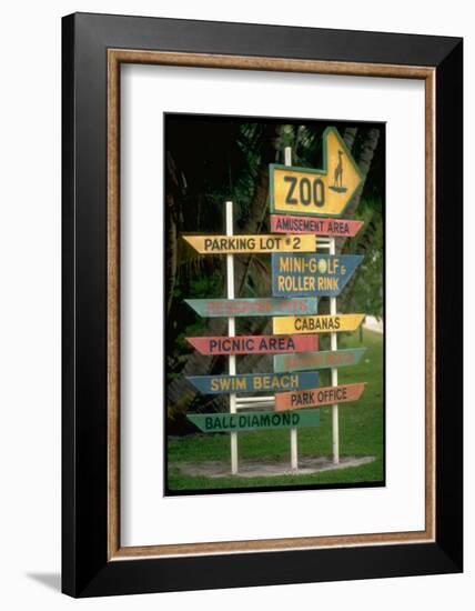 Signs Pointing Every Which Way, Key Biscayne, Florida-George Silk-Framed Photographic Print