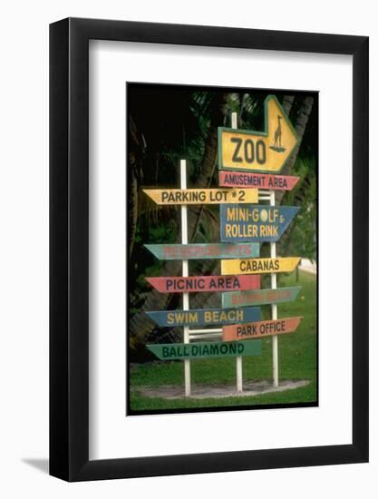 Signs Pointing Every Which Way, Key Biscayne, Florida-George Silk-Framed Photographic Print