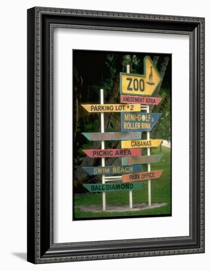 Signs Pointing Every Which Way, Key Biscayne, Florida-George Silk-Framed Photographic Print