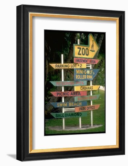 Signs Pointing Every Which Way, Key Biscayne, Florida-George Silk-Framed Photographic Print