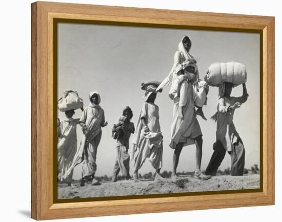 Sikh Carrying His Wife on Shoulders After the Creation of Sikh and Hindu Section of Punjab India-Margaret Bourke-White-Framed Premier Image Canvas