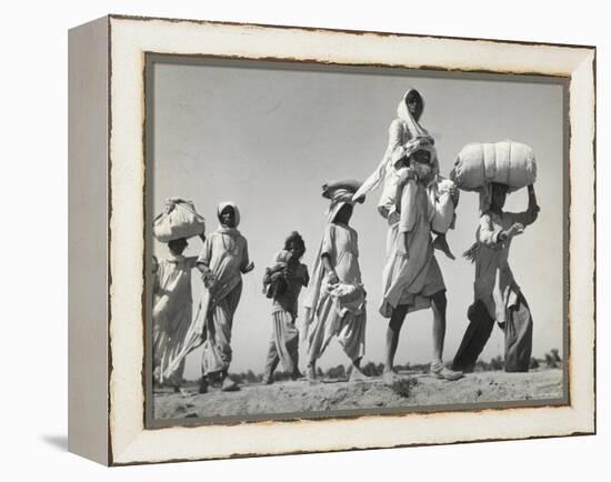 Sikh Carrying His Wife on Shoulders After the Creation of Sikh and Hindu Section of Punjab India-Margaret Bourke-White-Framed Premier Image Canvas