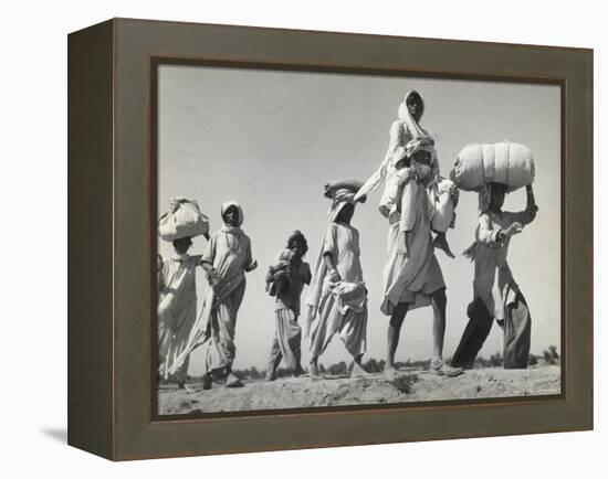 Sikh Carrying His Wife on Shoulders After the Creation of Sikh and Hindu Section of Punjab India-Margaret Bourke-White-Framed Premier Image Canvas