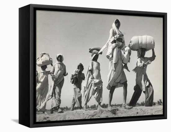 Sikh Carrying His Wife on Shoulders After the Creation of Sikh and Hindu Section of Punjab India-Margaret Bourke-White-Framed Premier Image Canvas