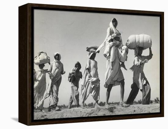 Sikh Carrying His Wife on Shoulders After the Creation of Sikh and Hindu Section of Punjab India-Margaret Bourke-White-Framed Premier Image Canvas