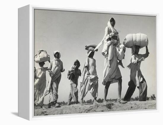 Sikh Carrying His Wife on Shoulders After the Creation of Sikh and Hindu Section of Punjab India-Margaret Bourke-White-Framed Premier Image Canvas