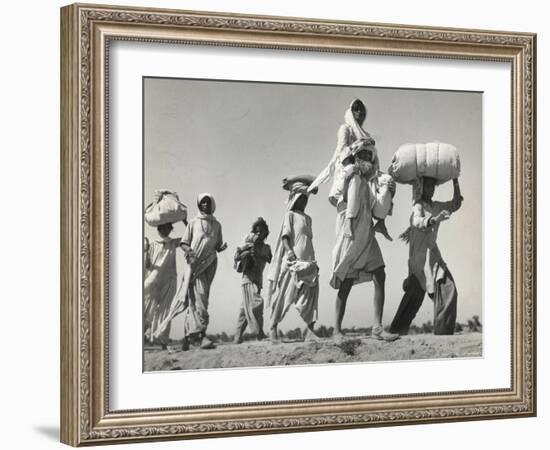 Sikh Carrying His Wife on Shoulders After the Creation of Sikh and Hindu Section of Punjab India-Margaret Bourke-White-Framed Photographic Print