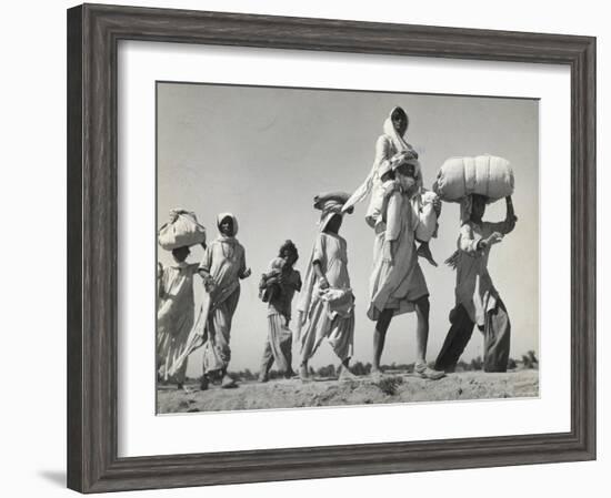 Sikh Carrying His Wife on Shoulders After the Creation of Sikh and Hindu Section of Punjab India-Margaret Bourke-White-Framed Photographic Print