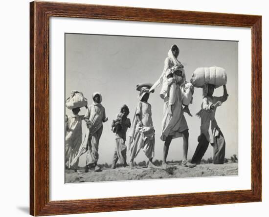 Sikh Carrying His Wife on Shoulders After the Creation of Sikh and Hindu Section of Punjab India-Margaret Bourke-White-Framed Photographic Print