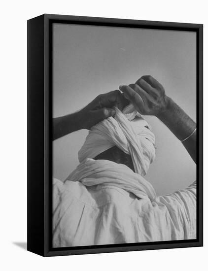 Sikh Man Demonstrating How He Finishes the Winding of His Traditional Turban around His Head-Margaret Bourke-White-Framed Premier Image Canvas