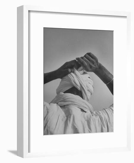 Sikh Man Demonstrating How He Finishes the Winding of His Traditional Turban around His Head-Margaret Bourke-White-Framed Premium Photographic Print