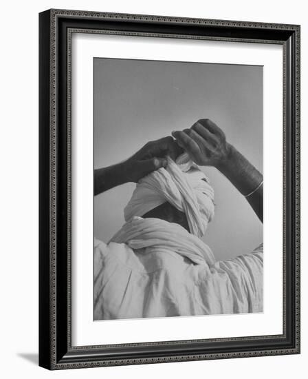 Sikh Man Demonstrating How He Finishes the Winding of His Traditional Turban around His Head-Margaret Bourke-White-Framed Premium Photographic Print