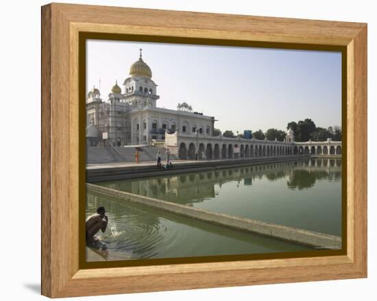 Sikh Pilgrim Bathing in the Pool of the Gurudwara Bangla Sahib Temple, Delhi, India-Eitan Simanor-Framed Premier Image Canvas