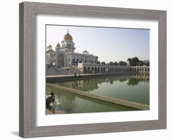 Sikh Pilgrim Bathing in the Pool of the Gurudwara Bangla Sahib Temple, Delhi, India-Eitan Simanor-Framed Photographic Print