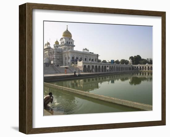 Sikh Pilgrim Bathing in the Pool of the Gurudwara Bangla Sahib Temple, Delhi, India-Eitan Simanor-Framed Photographic Print