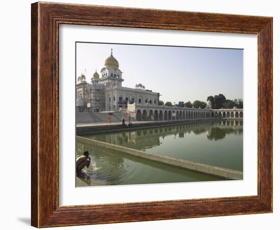 Sikh Pilgrim Bathing in the Pool of the Gurudwara Bangla Sahib Temple, Delhi, India-Eitan Simanor-Framed Photographic Print