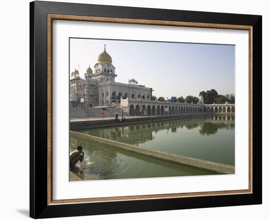 Sikh Pilgrim Bathing in the Pool of the Gurudwara Bangla Sahib Temple, Delhi, India-Eitan Simanor-Framed Photographic Print