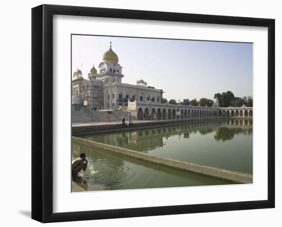 Sikh Pilgrim Bathing in the Pool of the Gurudwara Bangla Sahib Temple, Delhi, India-Eitan Simanor-Framed Photographic Print