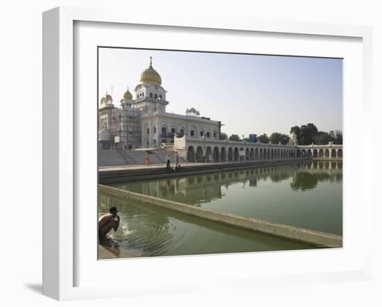 Sikh Pilgrim Bathing in the Pool of the Gurudwara Bangla Sahib Temple, Delhi, India-Eitan Simanor-Framed Photographic Print