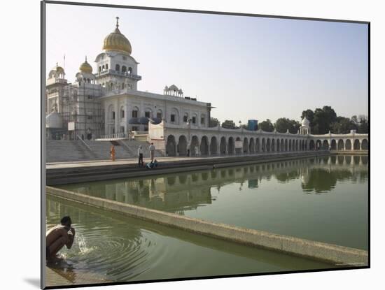Sikh Pilgrim Bathing in the Pool of the Gurudwara Bangla Sahib Temple, Delhi, India-Eitan Simanor-Mounted Photographic Print
